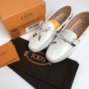 Tod’s white pearlized leather driving shoes